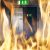 A fire occurring by an open black fire door
